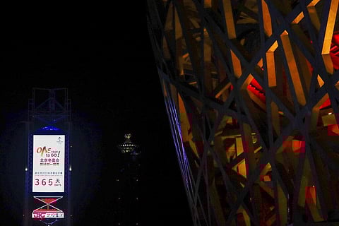 A countdown clock showing one year to go for the 2022 Beijing Olympics stands near the Olympics Tower (Photo | AP)