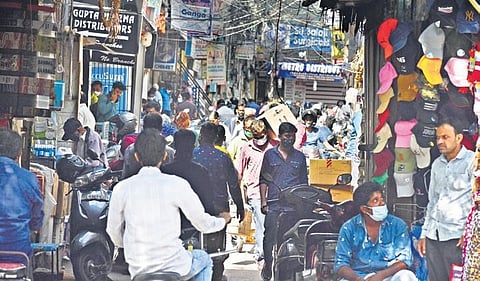 People throng the wholesale drug market at Sultan Bazaar in Hyderabad on Friday to buy medicines amidst rising number of Covid-19 cases | S Senbagapandiyan