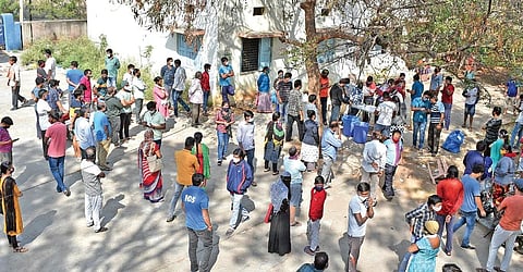 People wait for their turn to get themselves tested for Covid-19 at the Saroornagar UPHC in Hyderabad on Friday