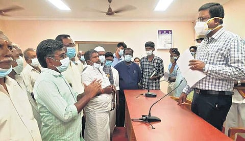 A group of Michaelpatti residents  submit petitions to Thanjavur Collector on Friday | Express