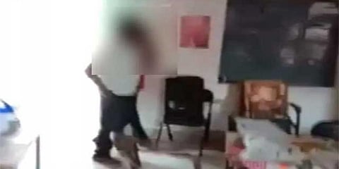 A video of the headmaster kissing the girl in his chamber at the school has gone viral on social media. (Photo | Twitter)