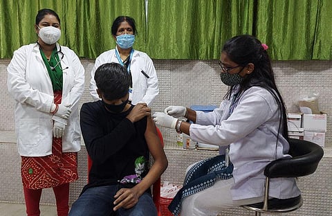 A person from the 15-18 age group taking the first dose of Covid vaccine in Bhubaneswar on Monday. (Photo | Twitter/@BMCBBSR)