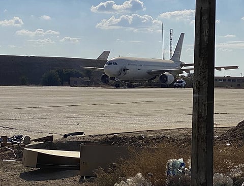 A damaged aircraft sits on the tarmac of Baghdad airport, after a rocket attack in Baghdad, Iraq, Friday, Jan. 28, 2022. (Photo | AP)