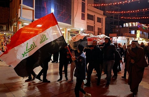 Mourners carry the flag-draped coffins of Iraqi soldiers killed in an attack by gunmen of the Islamic State extremist group, Iraq. (Photo |APAnmar Khalil)