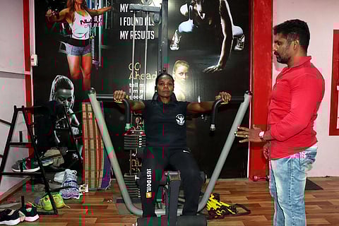 S Sangeetha hitting the gym; her gym master M Kumaravel giving instructions | S Dinesh