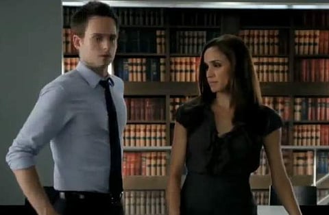 Meghan Markle and Patrick J. Adams in 'Suits'. (Youtube Screengrab)