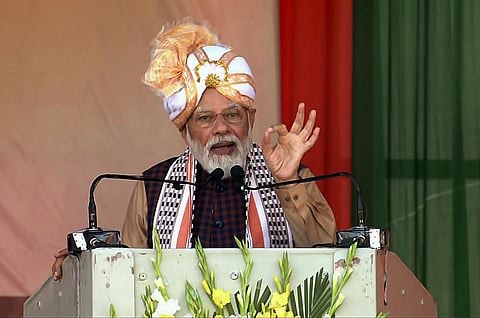 Prime Minister Narendra Modi addresses at the inauguration and stone laying foundation ceremony of 22 Development Projects worth over Rs. 4,800 crore, in Imphal on Tuesday. (Photo |ANI)