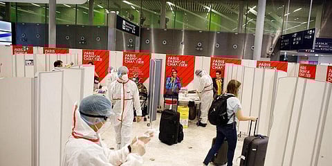 A passenger leaves after being tested with a COVID-19 test, at the Roissy Charles de Gaulle airport, outside Paris, Saturday, Aug. 1, 2020. (Photo | AP)