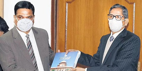 Chief Justice of India NV Ramana with retiring Justice Ramayyagari Subhash Reddy