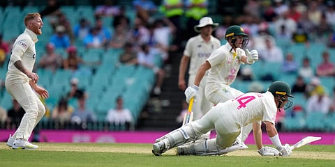 Australia's Marcus Harris falls while batting against England during an Ashes Test match in Sydney. (Photo| AP)