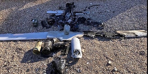 Parts of the wreckage of a drone are laid out on the ground near the Ain al-Asad airbase, in the western Anbar province of Iraq.(Photo | AP)
