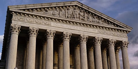 The Supreme Court is seen at dusk in Washington. (Photo | AP)