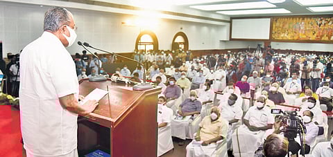 Chief Minister Pinarayi Vijayan explains the benefits of the SilverLine semi high-speed railway line at the ‘Janapaksham’ programme at TDM Hall in Kochi on Thursday | Albin Mathe w