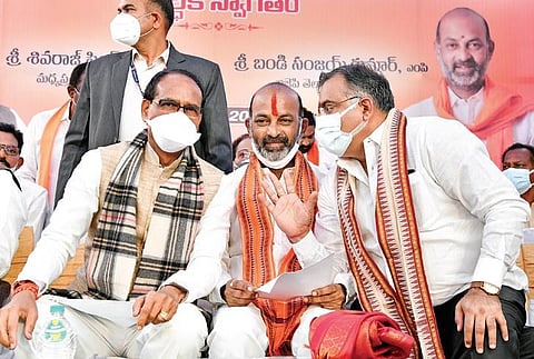 MP Chief Minister Shivraj Singh Chouhan, BJP TS president Bandi Sanjay and party TS in-charge Tarun Chugh seen at the party office on Friday | vinay madapu