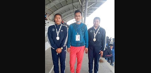 (From L) H Tendenthoi Devi, coach Debit Singh and Th Priya Devi