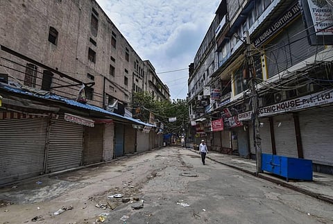 A view of deserted Bhagirath Palace market in Chandni Chowk during ongoing Covid-19 curfew in New Delhi. (Photo | PTI file)