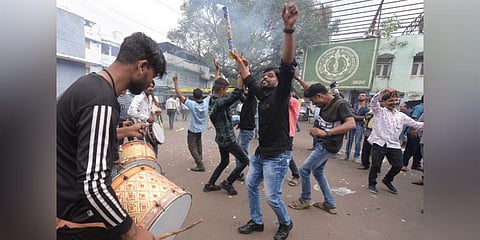 Municipal workers celebrate after Indore was declared as the cleanest city as per a government survey, in Indore. (Photo | PTI)
