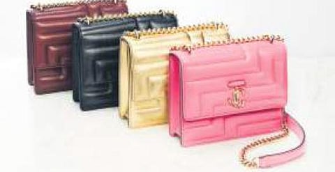 Varenne family of signature handbags