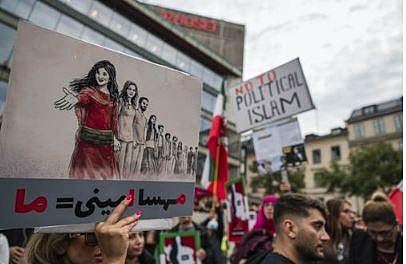 People protest following the death of an Iranian woman after her arrest by the country's morality police in Tehran. (Photo | AFP)