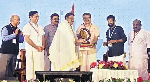 LSGD Minister M B Rajesh honouring S Krishnakumar, founder chairman of Greater Cochin Development Authority, at Bodhi-2022 National Urban Conclave on Sunday | A Sanesh