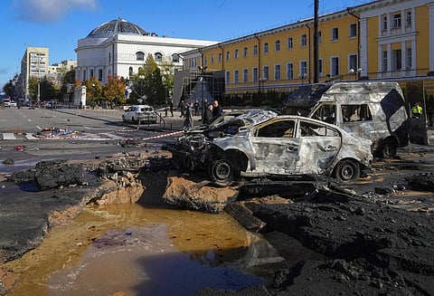 Police inspect the scene of Russian shelling in Kyiv, Ukraine, Monday, Oct. 10, 2022. (Photo | AP)