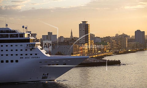 The MSC Opera cruise ship passes the Malecon sea wall as it leaves the harbor in Havana, Cuba. (File Photo | AP)