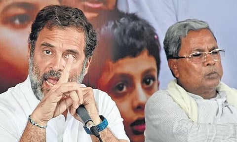 Congress MP Rahul Gandhi addesses the media, as CLP leader Siddaramaiah looks on | UDAYASHANKAR S