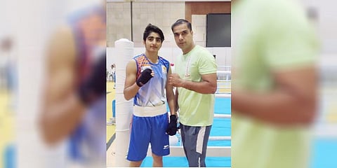 ​  Boxer Minakshi Hooda with coach Vijay Hooda.