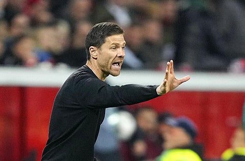 Leverkusen's head coach Xabi Alonso gives instructions to his players during the Champions League Group B soccer match between Bayer Leverkusen and Porto in Leverkusen, Germany (Photo | AP)