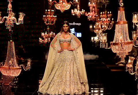 Bollywood actress Kriti Sanon walks the ramp for designers Shantanu and Nikhil during the Lakme Fashion Week in Mumbai. (Photo | PTI)