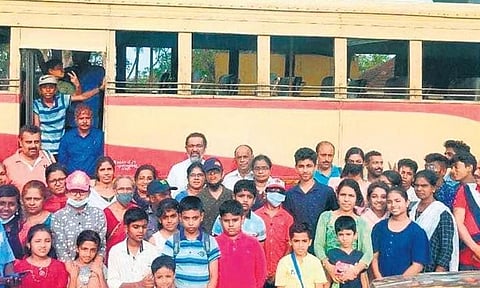 Students and teachers in front of the KSRTC bus they hired for tour in Alappuzha 