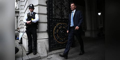 New UK finance minister tears up tottering PM's agenda