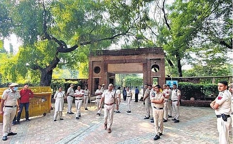 Police officers were stationed outside Arts Faculty of Delhi University | EXPRESS