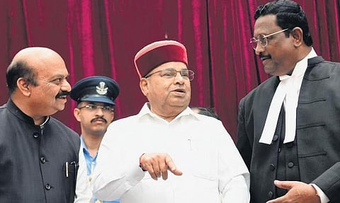 Chief Minister Basavaraj Bommai and Governor Thaawarchand Gehlot welcome new Chief Justice of Karnataka Justice Prasanna Balachandra Varale on Saturday