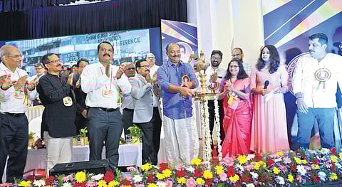 Finance Minister K N Balagopal inaugurating the eighth SBI triennial general  council meeting