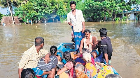 People being shifted to safety in a motorised boat as Kollidam floodwater surrounds Nadhalpadugai at Kollidam block in Mayiladuthurai district | EXPRESS
