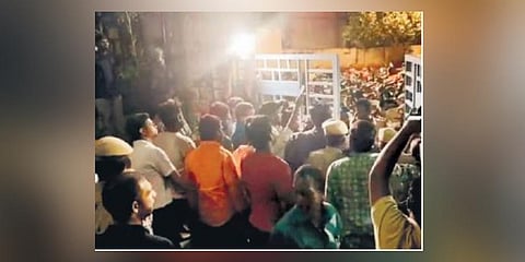 Parents protest outside DAV Public School at Banjara Hills on Tuesday. (Photo | EPS)