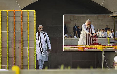 Prime Minister Narendra Modi pays homage to Mahatma Gandhi on the occasion of his birth anniversary, at Rajghat in New Delhi. (Photo | PTI)