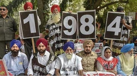 Family members of the victims of 1984 anti-Sikh riots stage a protest at Jantar Mantar, in New Delhi. (Photo | PTI)