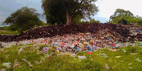 Garbages dumped in Kallaru river in V Kalathur in Perambalur district (Photo | Express)