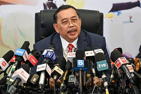 Malaysia's Election Commission (EC) chairman, Abdul Ghani Salleh speaks during a press conference in Putrajaya on October 20, 2022. (Photo | AFP)