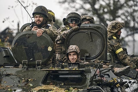 Ukrainian soldiers ride an APC in Donetsk region, Ukraine, Thursday, Oct. 20, 2022. (Photo | AP)