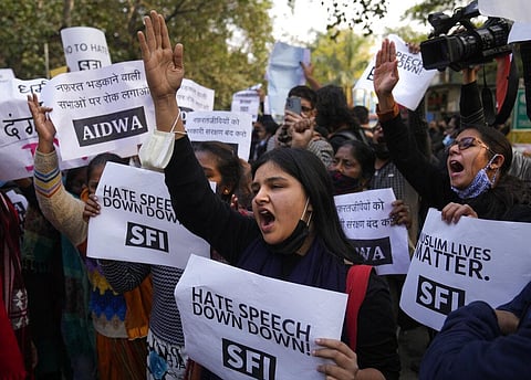 Activists of various left organizations shout slogans during a protest against hate speech in New Delhi on Dec 29, 2021. (File Photo | AP)
