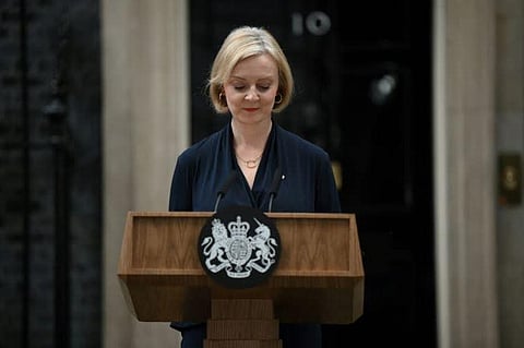 Britain's Prime Minister Liz Truss reacts as she delivers a speech outside of 10 Downing Street in central London on October 20, 2022 to announce her resignation. (Photo | AFP)