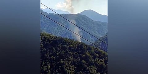 Smoke billows after an advanced light helicopter of the Indian Army crashed at Migging in Upper Siang district of Arunachal Pradesh. (Photo | PTI)