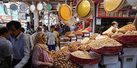 People purchase dry fruits at Chandni Chowk market ahead of the Diwali festival, in New Delhi, Saturday, Oct. 22, 2022.(Photo | PTI)