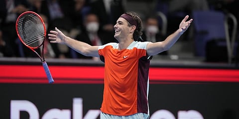 Taylor Fritz of the U.S. reacts after defeating Frances Tiafoe of the U.S. in their final match of the Japan Open tennis championships in Tokyo. (Photo | AP)
