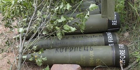 US-supplied M777 howitzer shells lie on the ground to fire at Russian positions in Ukraine's eastern Donbas region. (File photo | AP)