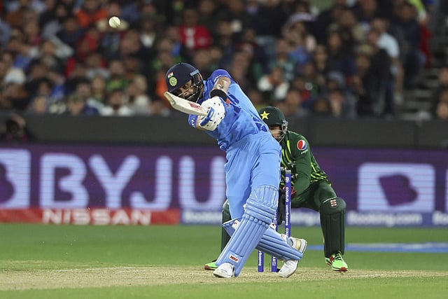India's Virat Kohli hits a six during the T20 World Cup cricket match between India and Pakistan in Melbourne, Australia. Kohli scored 83 from 53 balls, hitting 4 sixes and 6 fours. (Photo | AP)