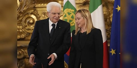 Italian President Sergio Mattarella gestures with the newly appointed Italian Premier Giorgia Meloni during the swearing in ceremony. (Photo | AP)